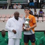Governor Akinwunmi Ambode (left) presents the men’s singkes trophy to Jack Draper from the Great Britain copy