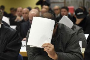 30 accused on trial in Germany for alleged refugee abuse