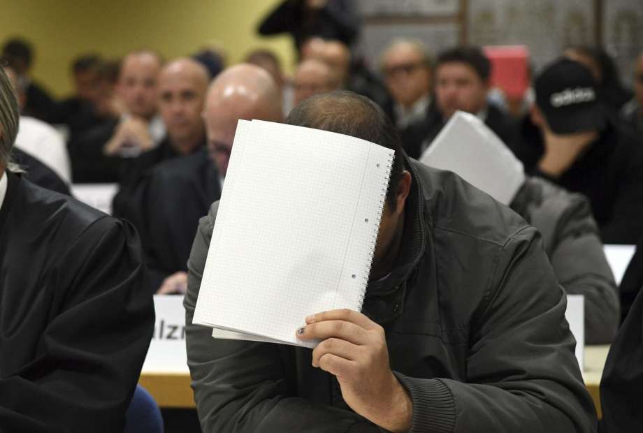 30 accused on trial in Germany for alleged refugee abuse