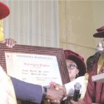 Ali (Left) receiving the certificate from the Founder of Oduduwa Uni- versity, Dr. Rahman Adedoyin after being conferred with the honor- ary doctorate degree at the institution