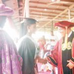 Inim receiving a handshake from Prof. Essien