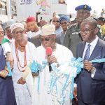 Obasanjo (middle) flanked by Governor Okowa (2nd right) and others, commissioning the stadium