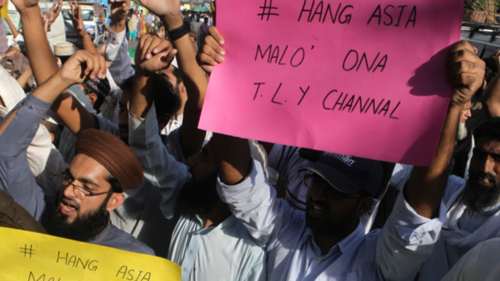 Pakistan shuts phone networks as Islamists protest over Christian woman