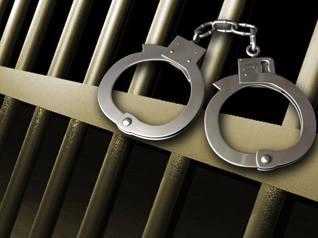 Prison-bars-and-handcuffs