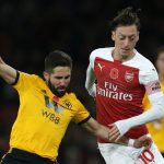 mesut-ozil-joao-moutinho-arsenal-vs-wolves-premier-league-2018-19_1mu2d3yqtrzqh14t5egzpppwdk
