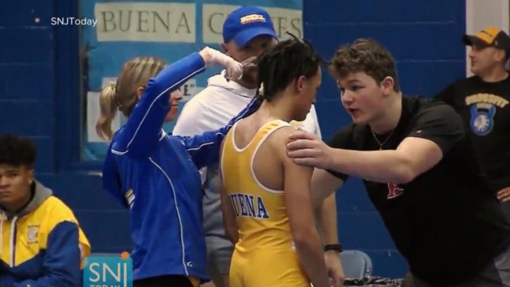 A US varsity wrestler told to cut dreadlocks or forfeit the match
