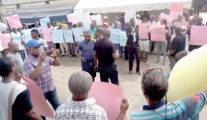 Festac residents protesting in front of EKEDC office