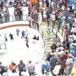 Lawmakers stranded at the lobby of the National Assembly as legislative aides, others stall plenary in protest of unpaid salaries and allowances, in Abuja, yesterday