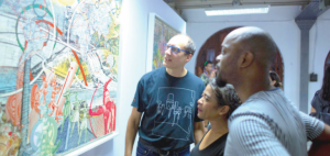 Participants admiring one of the work