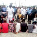 Some suspects being paraded by police officers in Yenagoa.