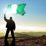 successful-silhouette-man-winner-waving-nigeria-flag-on_barwzorm__F0000