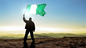 successful-silhouette-man-winner-waving-nigeria-flag-on_barwzorm__F0000