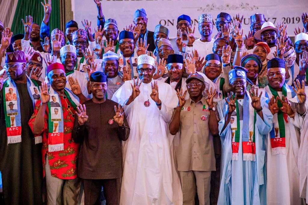 President Muhammadu Buhari (middle); at the inauguration of the APC Presidential Campaign Council in Abuja, yesterday