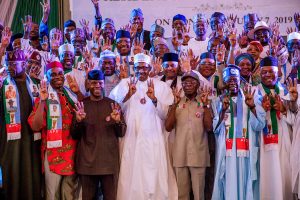 President Muhammadu Buhari (middle); at the inauguration of the APC Presidential Campaign Council in Abuja, yesterday