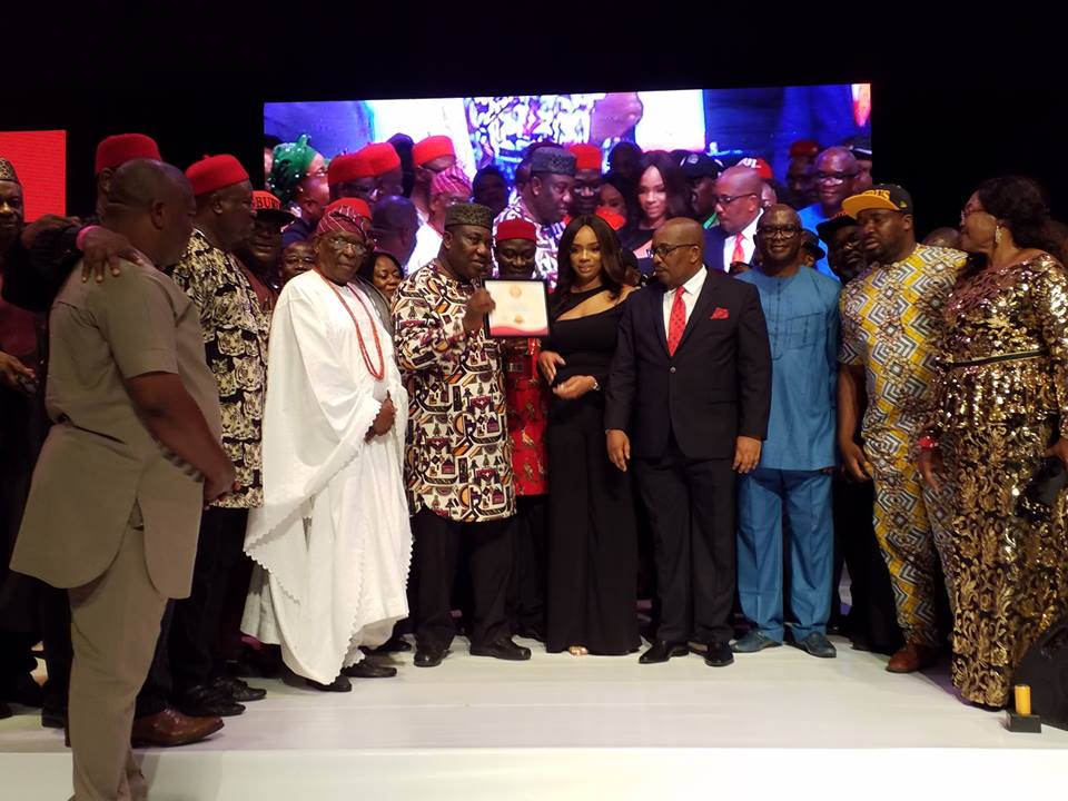 Gov Ugwuany dislaying his certificate of award at The Su Awards night (1)