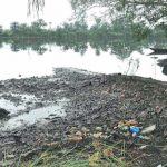 Polluted waters of Ogoniland (Inset: Dr Sam)