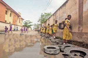 Pupils navigating their way into the school complex