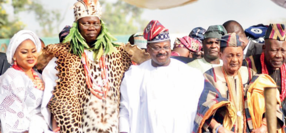 R-L: Oba Saliu Adetunji, Olubadan of Ibadan, Alaafin Adeyemi, Governor Abiola Ajimobi, Aare Adams and his wife, Mojisola, at the installation last year