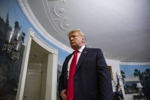 U.S. President Donald Trump leaves after delivering a statement on the government shutdown in the Diplomatic Reception Room of the White House in Washington, D.C., U.S., on Saturday, Jan. 19, 2019. Trump put forward a proposal that includes both $5.7 billion in funds for the border wall and relief for so-called Dreamers as he is seeking to reopen negotiations with the Democrats in the midst of the longest shutdown in U.S. history. Photographer: Alex Edelman/Bloomberg via Getty Images