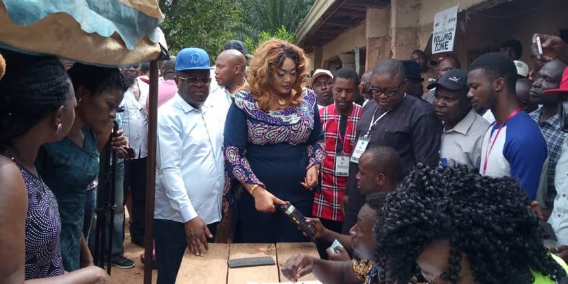 Governor Umahi (l) and wife (r) vote during gubernatorial and state legislative elections on Saturday, March 9