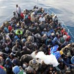 A-boat-load-of-migrants-crossing-the-sea.