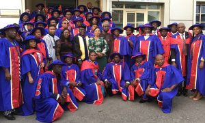 A-cross-section-of-new-members-of-CIFIAN-with-the-pro-tem-president-Mrs-Victoria-Enape-middle-in-green