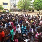 Cross section of pupils waiting at Ikotun High School, Lagos to write 2019 NCEE Photo Gbariel Dike