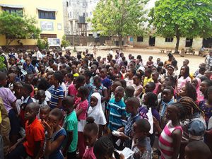 Cross section of pupils waiting at Ikotun High School, Lagos to write 2019 NCEE Photo Gbariel Dike
