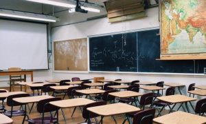 Empty-classroom-with-chairs-and-reading-tables