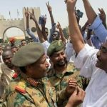 General-Abdel-Fattah-al-Burhan-with-some-protesters-on-Friday–e1555190294925
