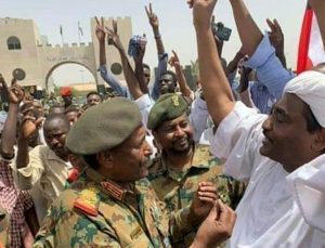 General-Abdel-Fattah-al-Burhan-with-some-protesters-on-Friday–e1555190294925