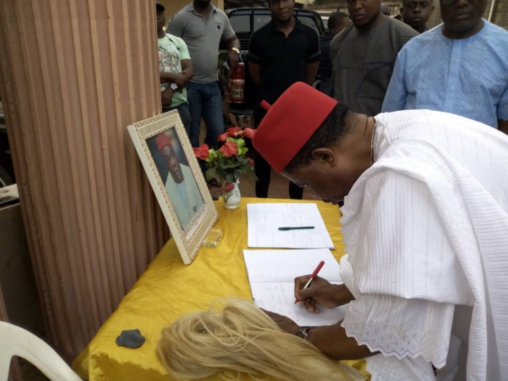 Gov. Willie Obiano signing the condolence register at the home of the assassinated President General of Nimo Community, Chief Frank Anthony Igboka