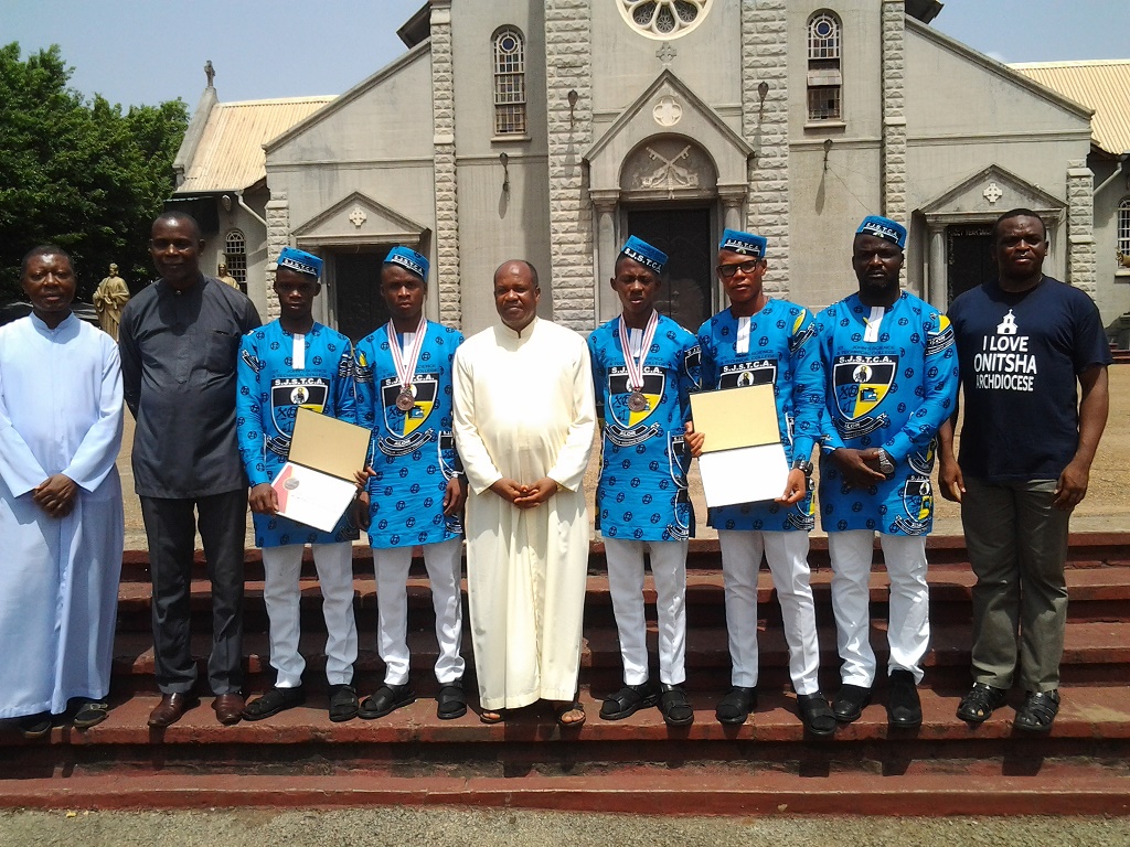Fr Prudentus Aroh, Unegbu and the Bronze medalists at the Basilica of the Most Holy Trinity Onitsha Photo Aloysius Attah