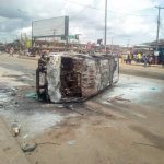 Burnt official bus of PUWOV during the crisis yesterday in Benin