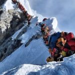 Climber-on-Mount-Everest-768×415