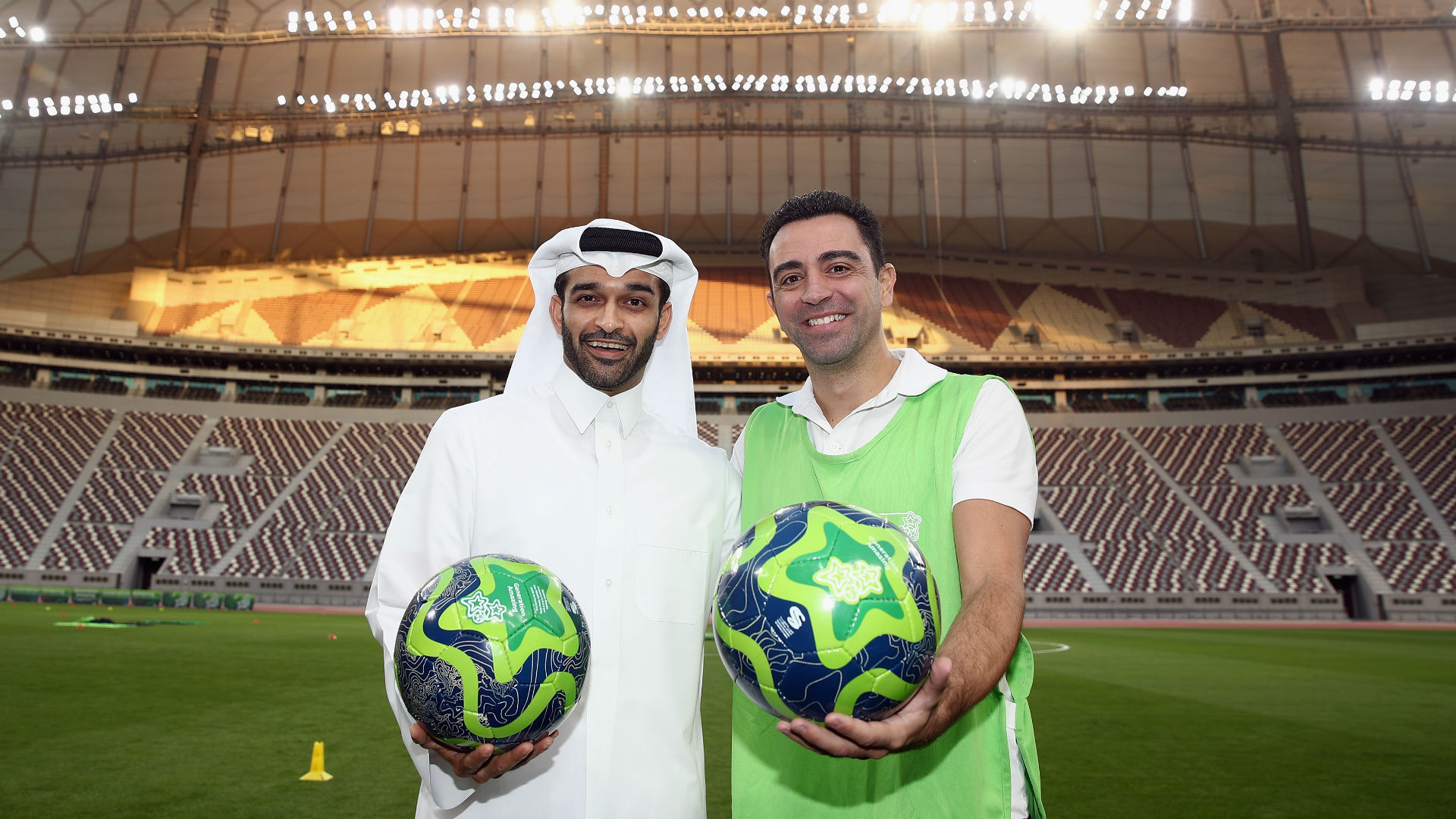 Hassan-al-thawadi-and-Xavi-Hernandez