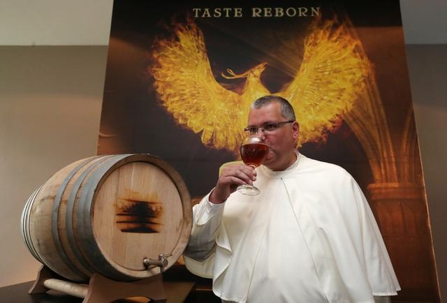 Rev Fr Karel tasting the beer (1)