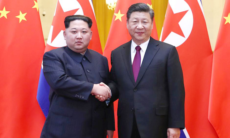 Kim-and-XI