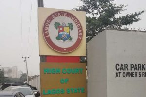 Lagos community head remanded by federal court for fraud