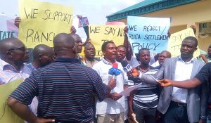 Mr Daniel Angyu addressing the press during the protest