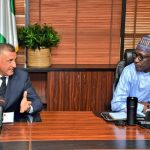 ENi/Agip’s Brusco Guido (left), NNPC’s Mele Kyari (right)