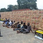 Oyo State Commissioner of Police Shina Olukolu parades suspected armed robbers with recovered loot of 410 pieces of new Sumecportable generators and 560 gallons of 4 litre Conoil Engine Oil, during press briefing held at Police Headquarters, Eleyele Ibadan (26/08/2019, Photo credit: GBENGA OLUGBODI)