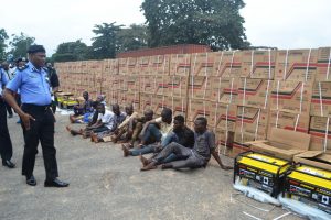 Oyo State Commissioner of Police Shina Olukolu parades suspected armed robbers with recovered loot of 410 pieces of new Sumecportable generators and 560 gallons of 4 litre Conoil Engine Oil, during press briefing held at Police Headquarters, Eleyele Ibadan (26/08/2019, Photo credit: GBENGA OLUGBODI)