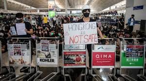 Police brutality- Anti-govt protesters shut down Hong Kong airport