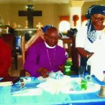 Bishop Maduwike (seated, centre) and his wife Anuri (standing, right) in a 2015 file photo