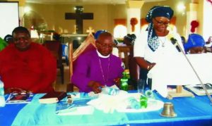 Bishop Maduwike (seated, centre) and his wife Anuri (standing, right) in a 2015 file photo