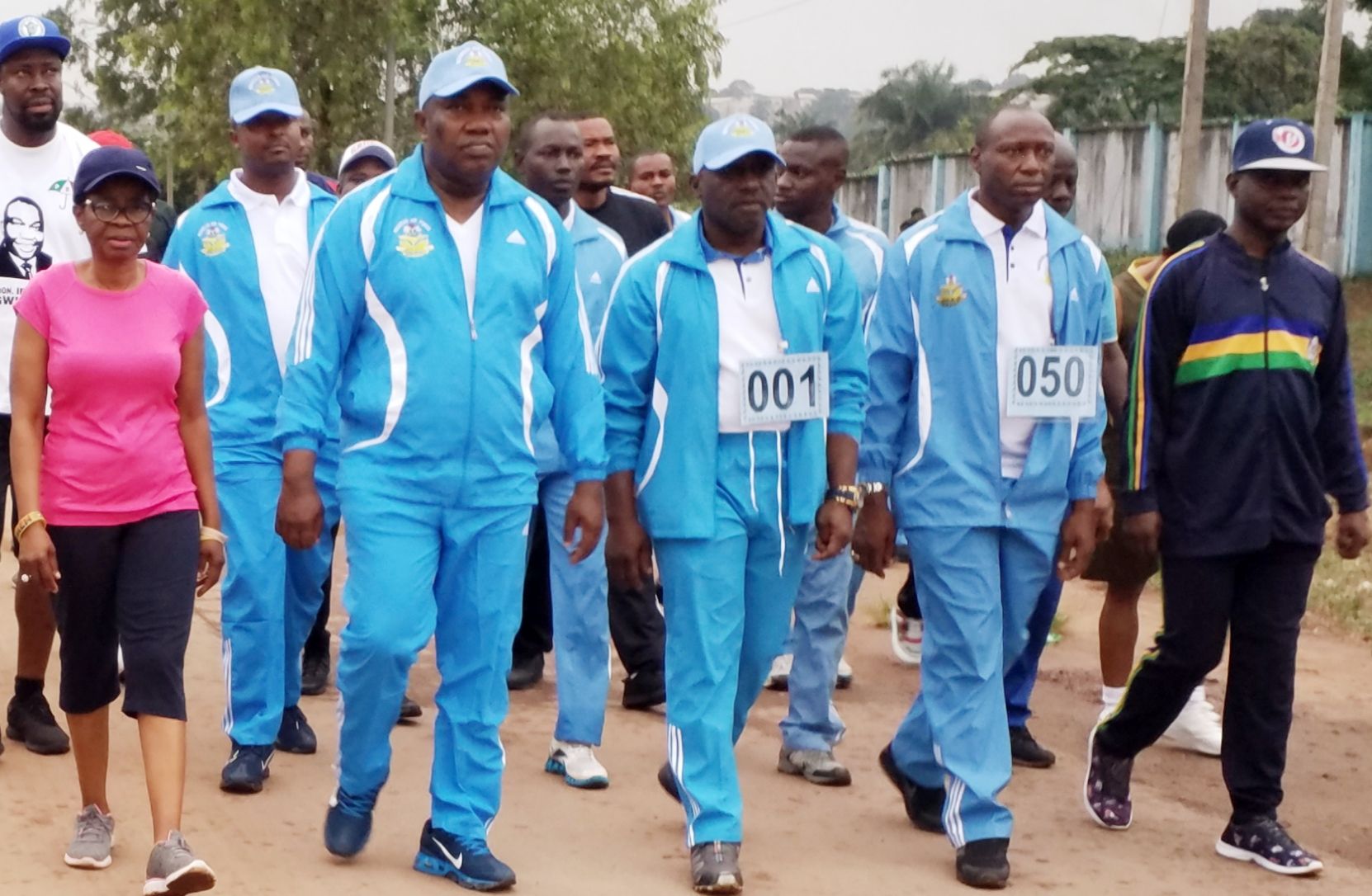 Ugwuanyi marching with NAF officers on the occasion