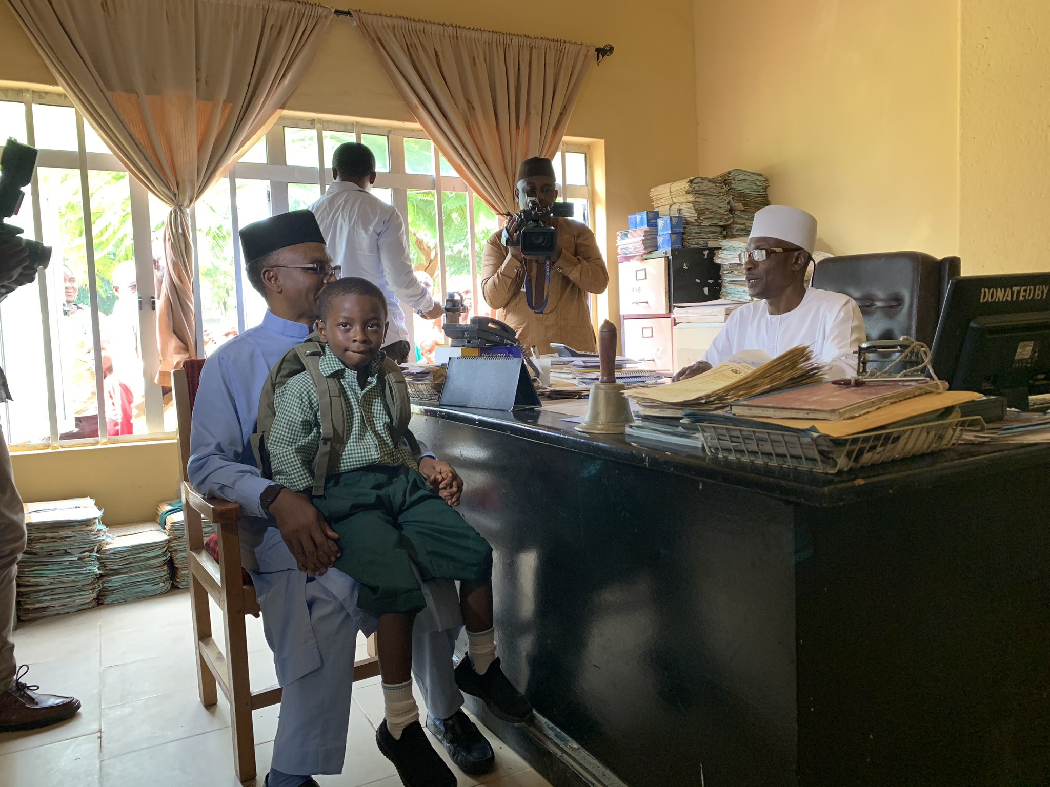 Kaduna State Governor Nasir El-Rufai (l) with son