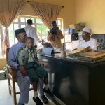 Kaduna State Governor Nasir El-Rufai (l) with son
