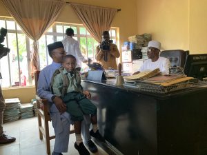Kaduna State Governor Nasir El-Rufai (l) with son